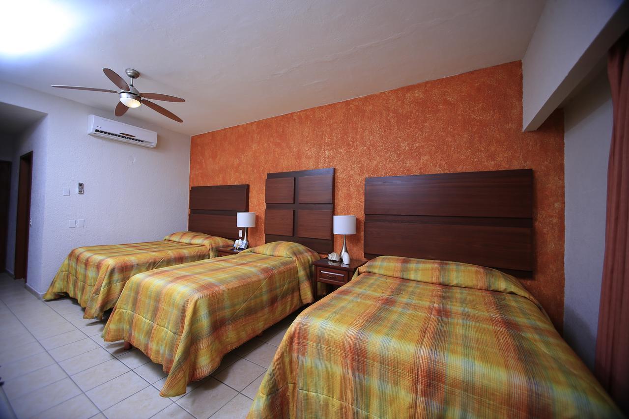 Hotel Playa Del Sol Лос-Баррилес Экстерьер фото